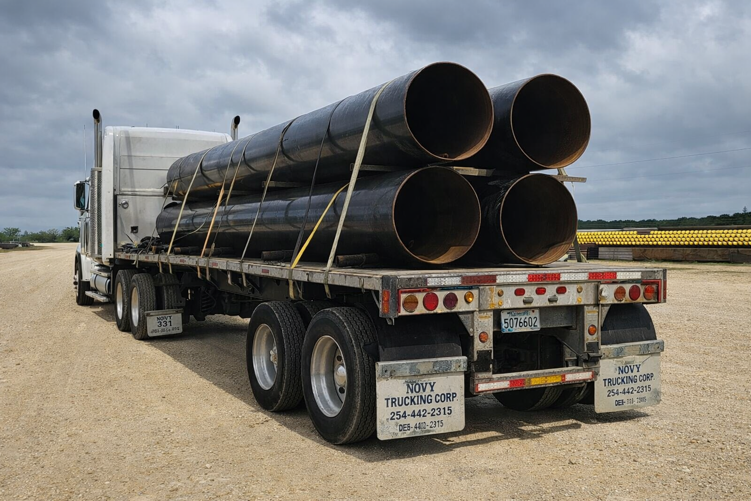 Stacked carbon steel pipe at distribution yard